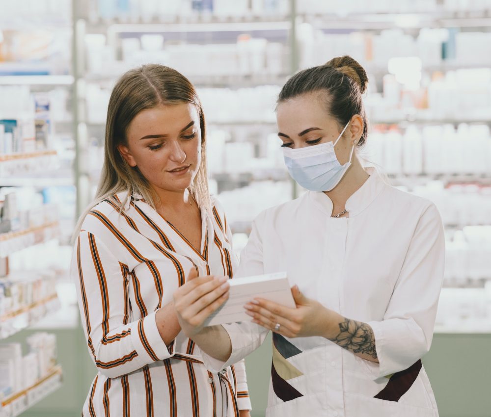 woman pharmacist checking medicine in pharmacy.jpg